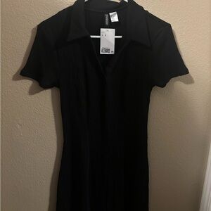 Black short sleeve and V- neck dress